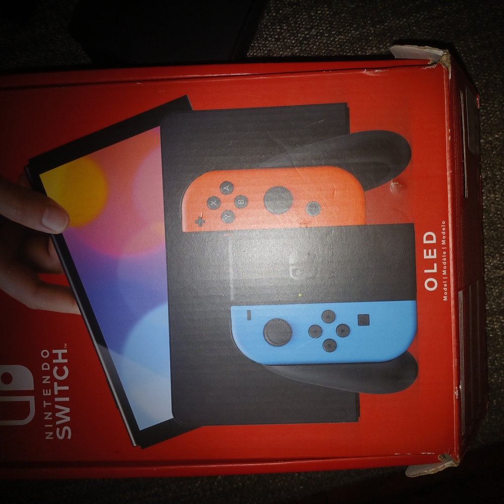 Nintendo Switch Console Red and Blue Joy-Con Controllers